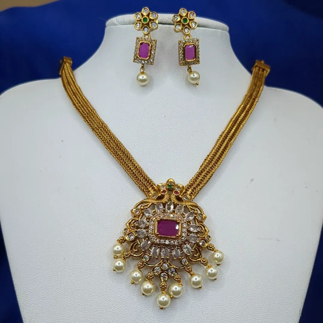 Trendy Halskette mit Ohrringe - gold | Magenta