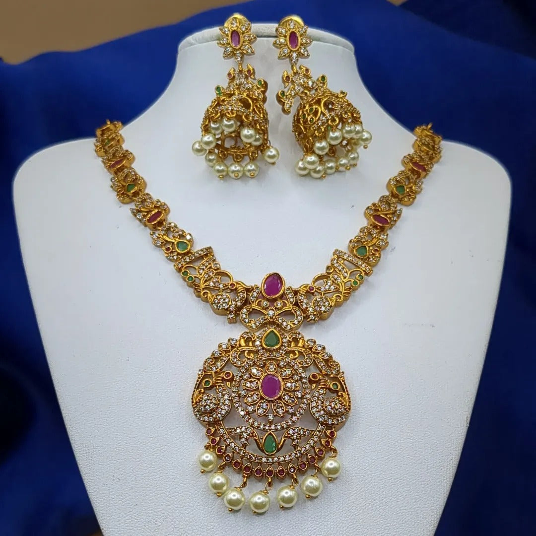 Trendy Halskette mit Ohrringe - gold