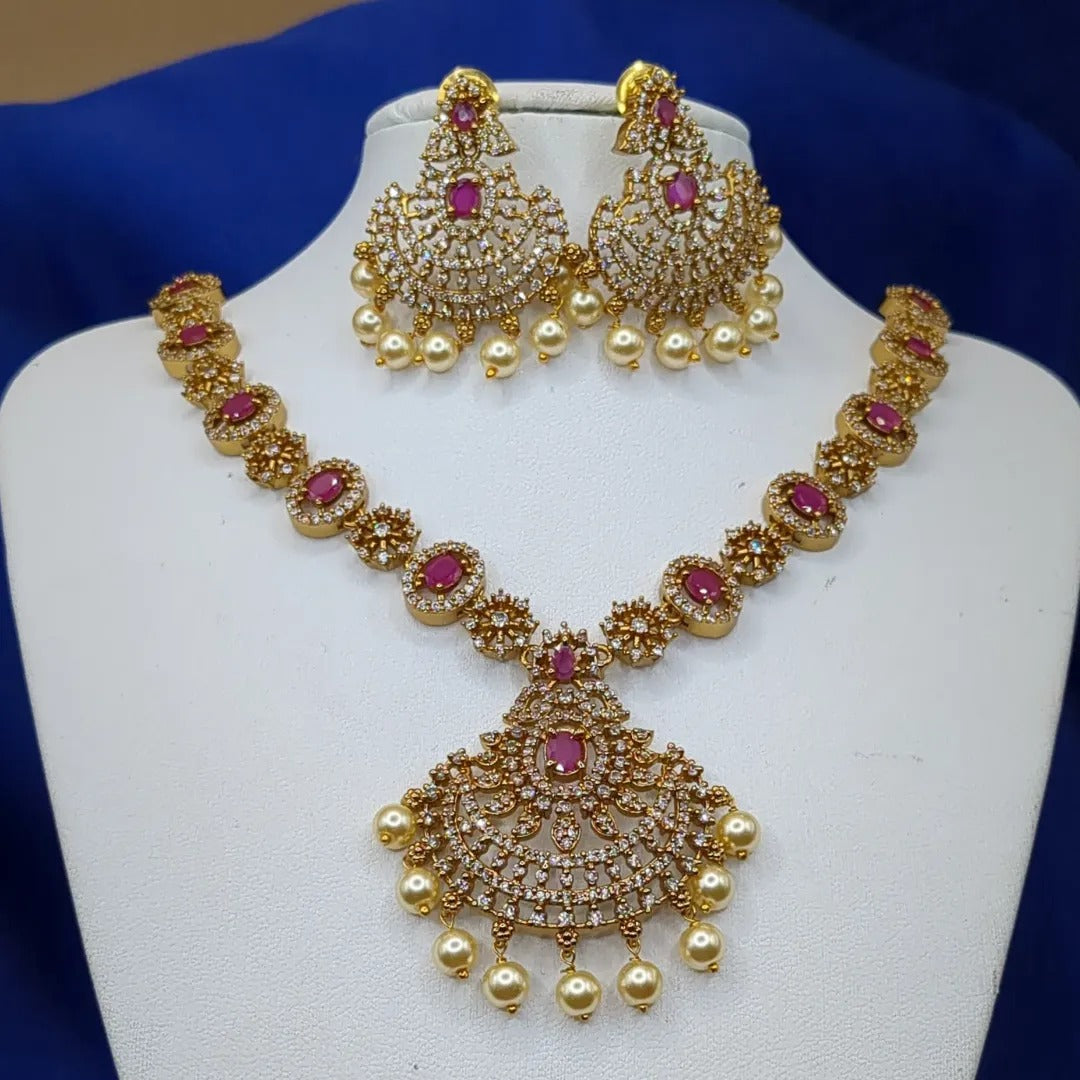 Trendy Halskette mit Ohrringe - gold | Magenta