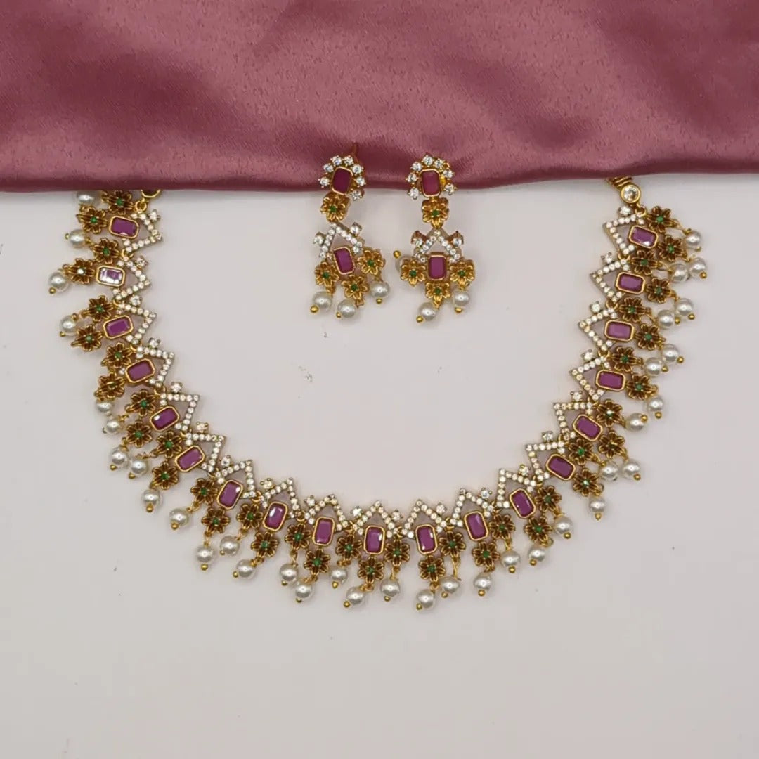 Trendy Halskette mit Ohrringe - gold | Magenta